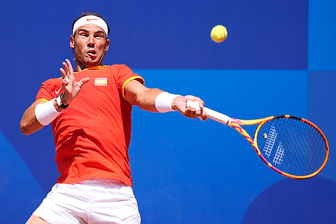 Rafael Nadal slams a forehand to Serbia's Novak Djokovic 